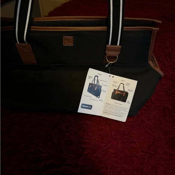 adorable doggy tote, comfortable cushion inside mash top with a leash attachment - Picture 2 of 7